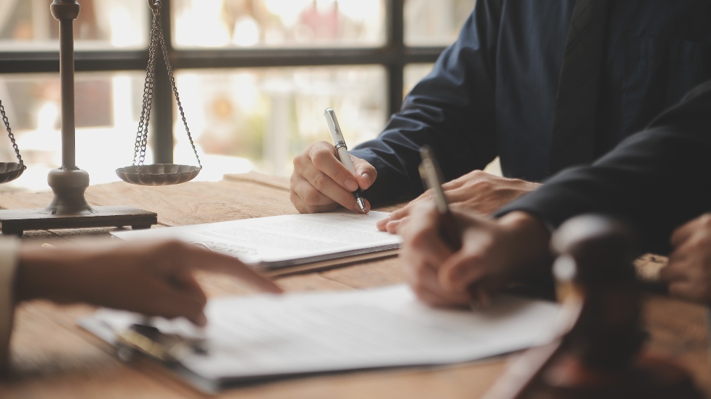 lawyer is working on client's trial