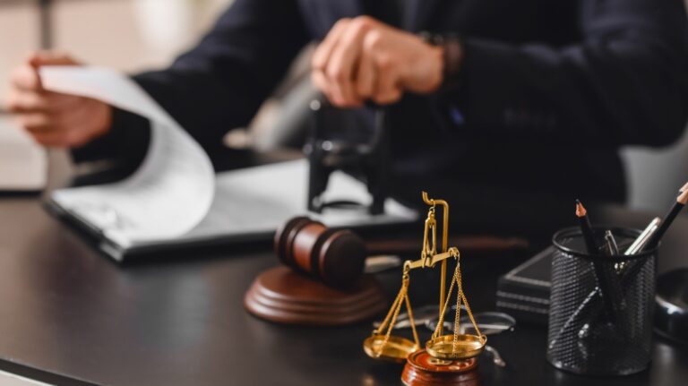 Lawyer is putting stamp on the document