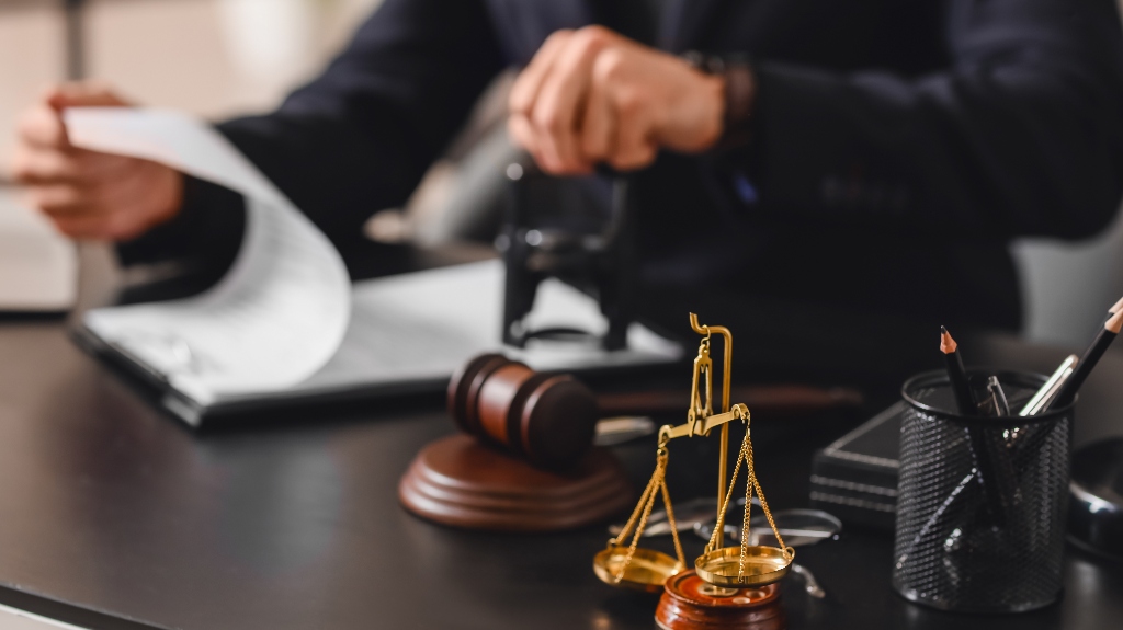 Lawyer is putting stamp on the document