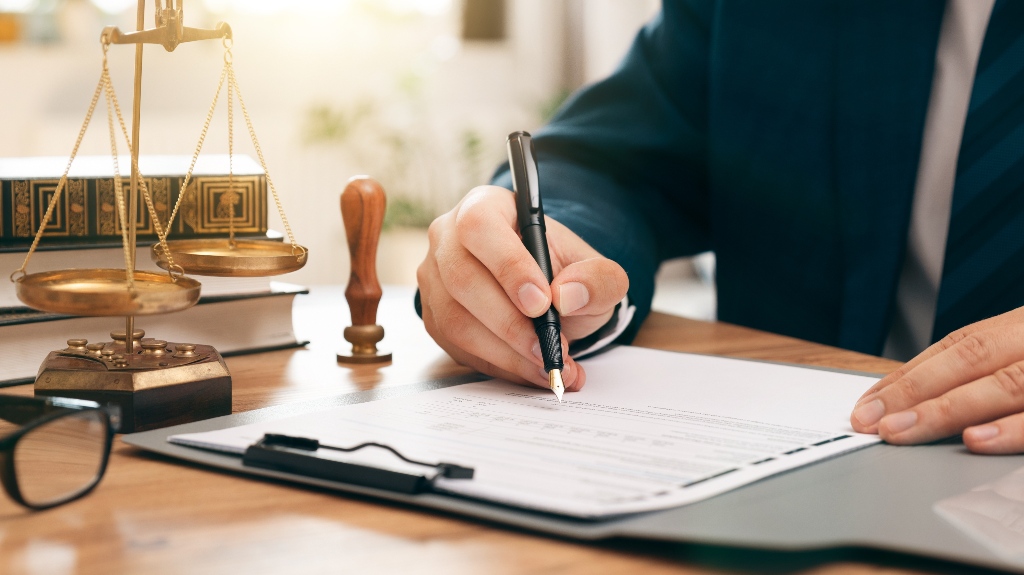 Lawyer is working with documents in the office