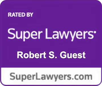 Purple and white badge stating "Rated by Super Lawyers" with the name Robert S. Guest.